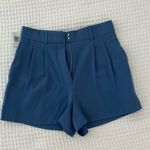 A baton pleated 3” shorts